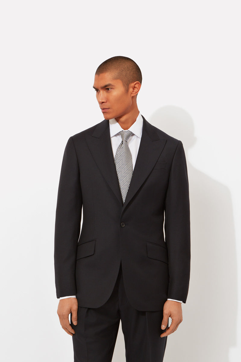 Peaked top lapel overcoat